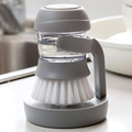 LavaPro™ cepillo con dispenser de jabón sobre su base
